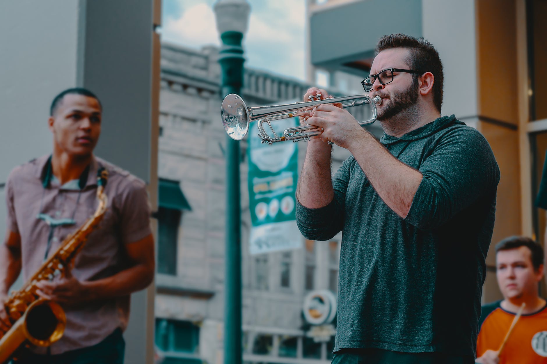 man playing wind instrument